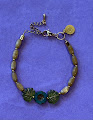 46f178e368fd087fd3e911c0e2dde044.png Urban Hippies Armbånd Poppy Green & Beige